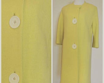 Advancing Vintage Yellow Coat with Large Buttons