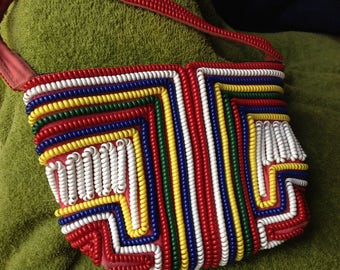 Vintage multicolored telephone cord handbag with different designs front & back