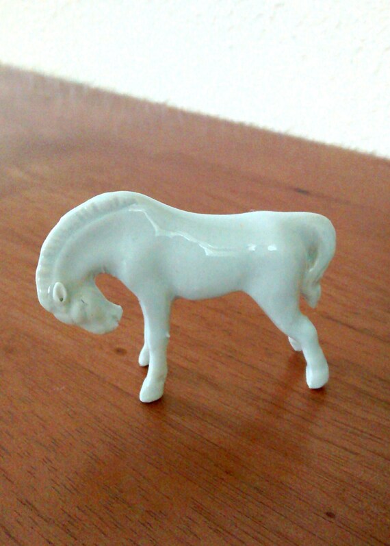 white porcelain horse