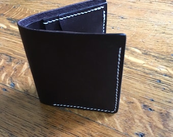 Handmade leather bifold wallet in dark brown