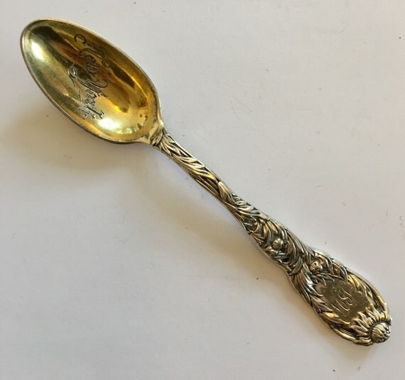 Spot the Tiffany spoon in this photograph Original solid