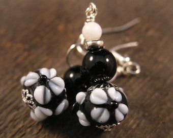 Black lamp work glass with white flowers, snow quartz stone, silver handmade earrings