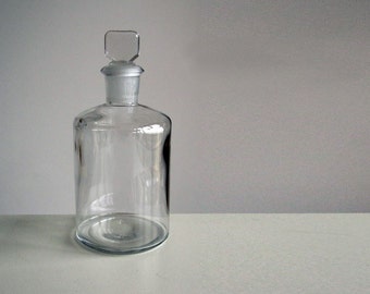 Glass apothecary bottle with stopper / chemist's jar display