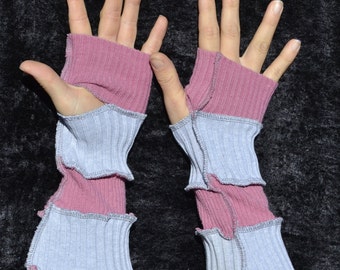 pink and gray striped arm warmers