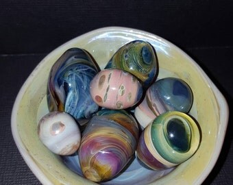 Glass bowl with seven glass eggs