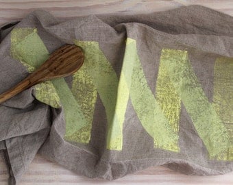 Green and yellow zig zag tea towel