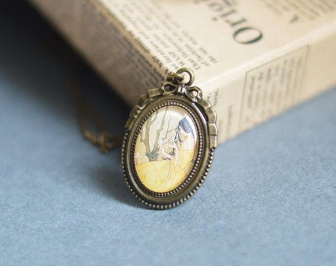 FEMALE IMAGES Oval pendant metal brass with the image of girl under glass , Yellow and Brown, Vintage and Rustic