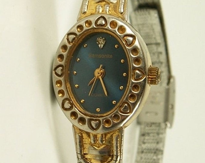Storewide 25% Off SALE Lovely Vintage Ladies Samsonite quartz watch with etched gold and silver toned face and band