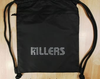 The Killers logo (7.5" x 1.75") in brilliant rhinestones Deluxe Drawstring and (Zipper side pouch) Bag- ** Free Shipping in the U.S.**