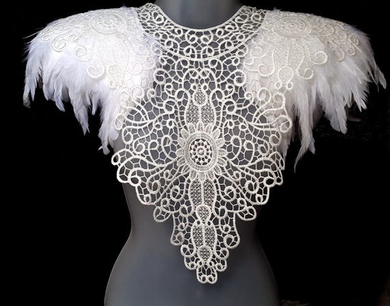 White feather epaulettes. Steampunk feather and lace collar. Bridal feather and lace collar. Feather cape alternative. 'Flora' Also in Black by BurningPlaya steampunk buy now online White feather epaulettes. Steampunk feather and lace collar. Bridal feather and lace collar. Feather cape alternative. 'Flora' Also in Black by BurningPlaya steampunk buy now online