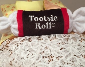 tootsie roll embroidered plush pillow