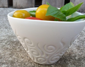 Hand carved, wheel-thrown porcelain bowl