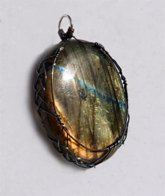Labradorite pendant wrapped Celtic style with sterling silver and copper