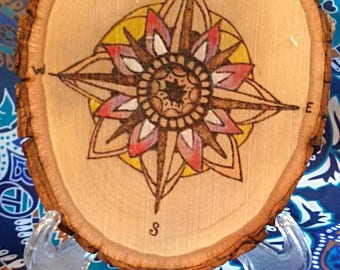 Wood burned compass rose