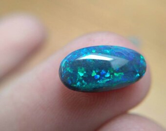 2CT BLACK OPAL with blue base and pinfire blues/greens!
