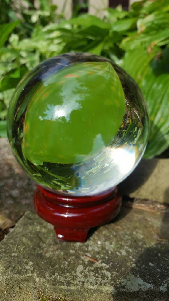 Large 110 MM Real Clear Crystal Ball with instructions on