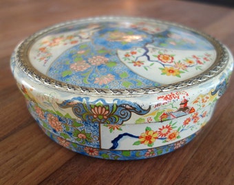 Beautiful vintage round cake or cookie tin with Japanese style flower decoration