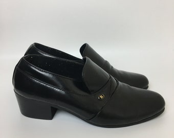 Shiny black leather loafers