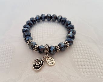 Dark grey stretch glass bead bracelet with silver-tone charms