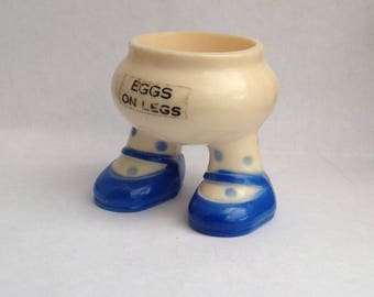 Vintage plastic 'Eggs on legs' egg cup 1970s