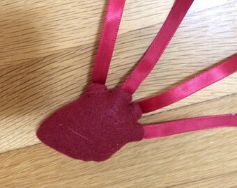 Bleeding anatomical human heart catnip-filled cat toy