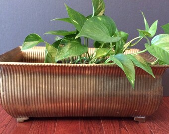 large brass footed planter / Hollywood Regency