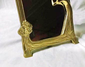 Beautiful and unique Vintage solid Brass framed table mirror, 3-D lady and raised flowers on frame; Lady in the Looking Glass mirror