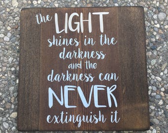 Light Shines in the Darkness - rustic painted wood sign