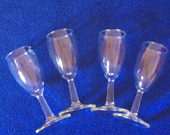 Shot or aperitif glasses. Set of four stemmed glasses for after dinner drinks or shots. Two ounce capacity.