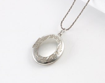 Sterling Oval Locket with Floral Border