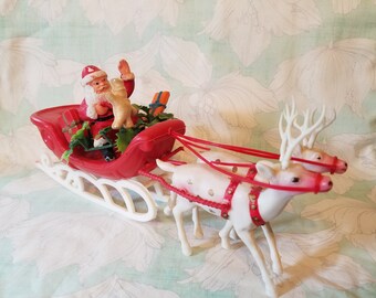 Vintage christmas santa sleigh deer presents