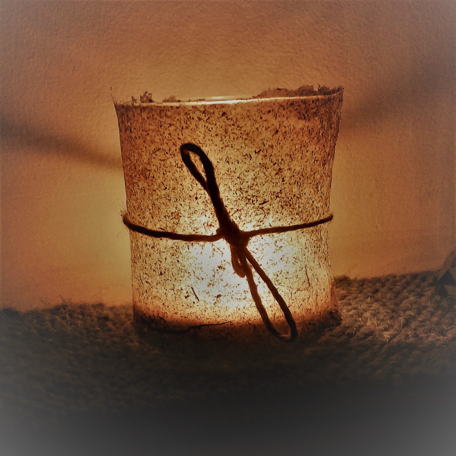 Glass tea light holder with paper shade