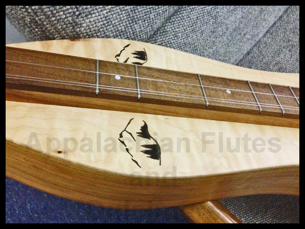 California grown, Claro burl Walnut finger-board.