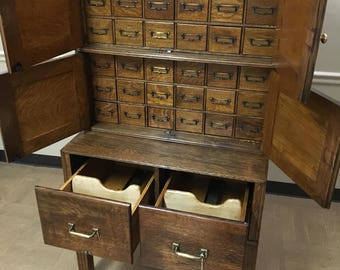 Beautiful Antique Solid Oak Multi Drawer File Cabinet 33w25d17d31h62h Shipping is not free