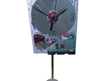 Early 1980s Hard Drive Pendulum Clock. Pendulum is a Laptop Disk Platter. Historical Gadget.