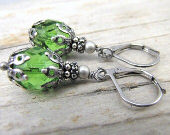 Peridot green earrings minimalist tiny glass drop antique style dark silver end caps stainless steel lever back ear wires closed earrings