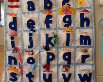 Felt alphabet wall hanging for nursery or bedroom.
