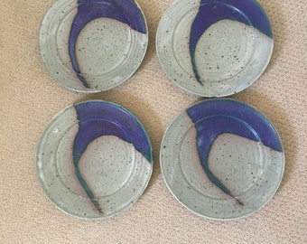 Four Handmade ceramic dinner plates