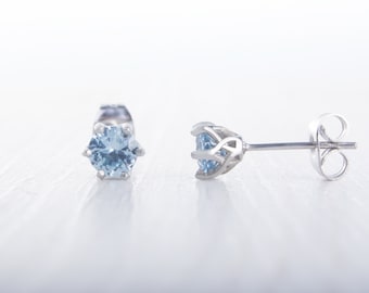 Natural Aquamarine stud earrings, available in titanium, white gold and surgical steel 4mm or 5mm sizes
