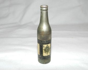 Kem Lighter - Vintage metal Bottle shaped cigarette lighter with Aces around the bottle - Kem Co. Detroit, Mich. Made in U.S.A. 23-61
