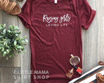 Raising Girls Loving Life © THE ORIGINAL | Girl Mom Shirt | Mom Life Shirt | Trendy Tees | Mother's Day Gift | Women's Shirt | Mom of Girls
