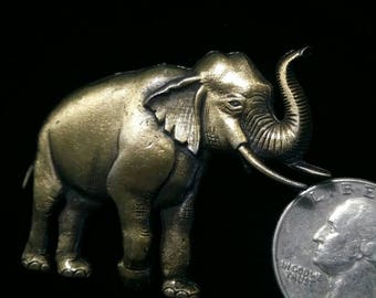 Elephant trunk up brooch
