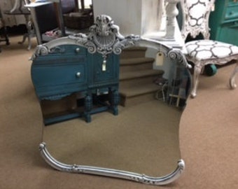 Shaped Mirror with Ornate Carved Trim