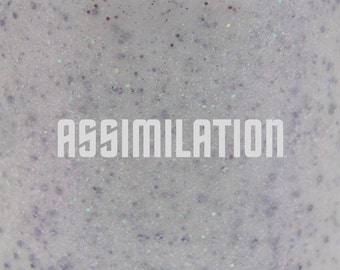 Assimilation glitter nail polish 15 mL (.5 oz) from the "Trek" Collection