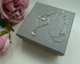 Sterling silver chain necklace with sterling silver diamond nimbus pendant, rose quartz and pink amethyst briolettes.