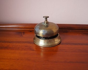 Vintage brass hotel reception desk, brass bell, shop counter bell.