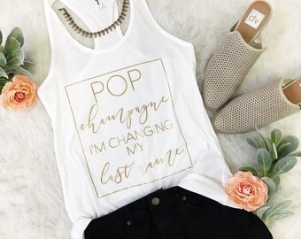 bride shirt. Bachelorette party shirts. Bridal party shirts.bachelorette party tanks. Pop champagne im changing my last name tank.Bride gift