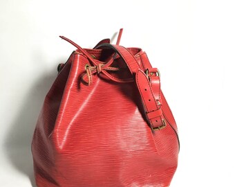 Authentic Louis Vuitton bag. Louis Vuitton Epi Noe bag. Louis Vuitton shoulder bag. Louis Vuitton red Epi bag. Louis Vuitton bucket bag.