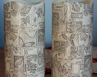 Two stylish, hand-decorated LED candles