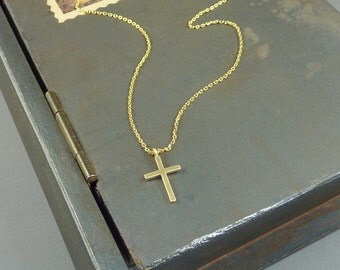 Faith. Tiny Gold Cross Necklace. 16k yellow gold plated. modern. delicate. layering. minimal. faith jewelry.